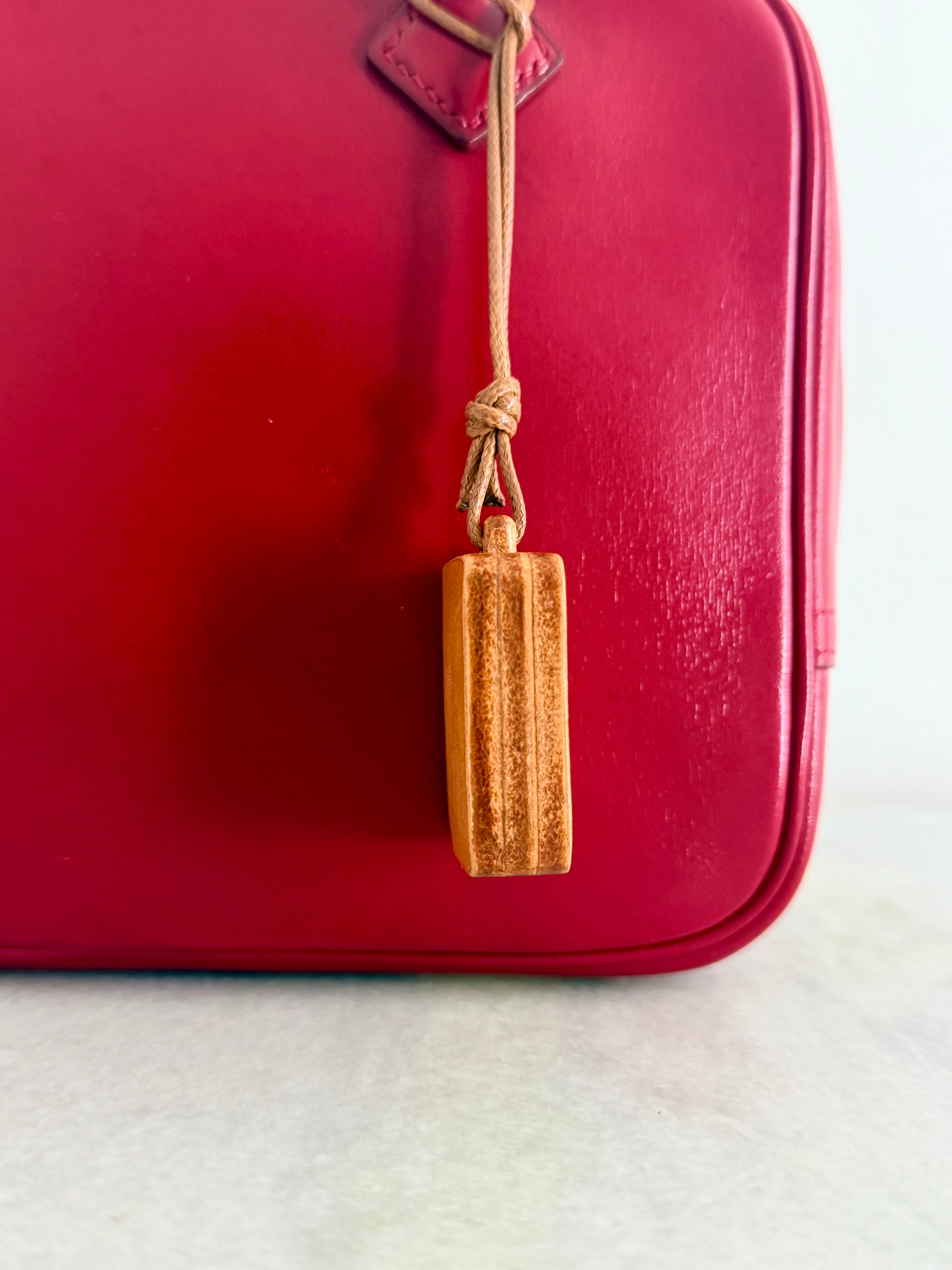 Handmade leather bag charm